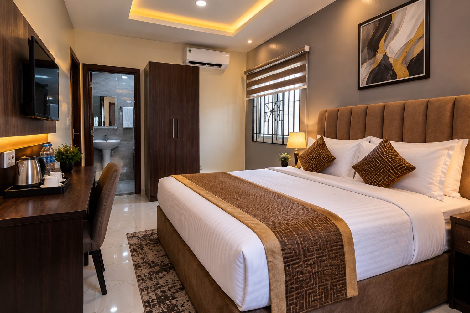 Comfortable guest room with intercom at More Care Hotel